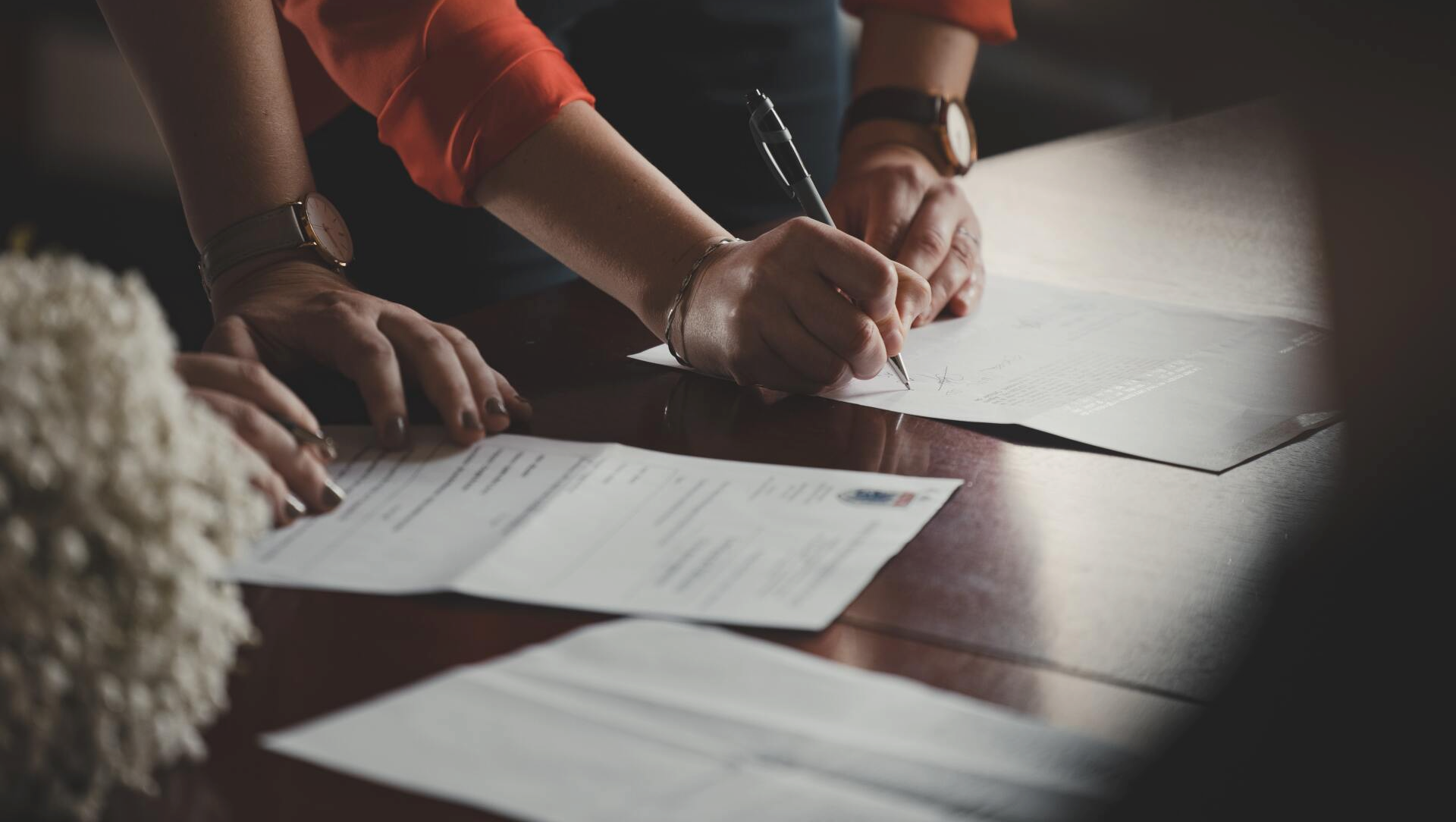 People Signing HIPAA forms